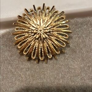 Monet Gold Starburst Brooch Radiant Design